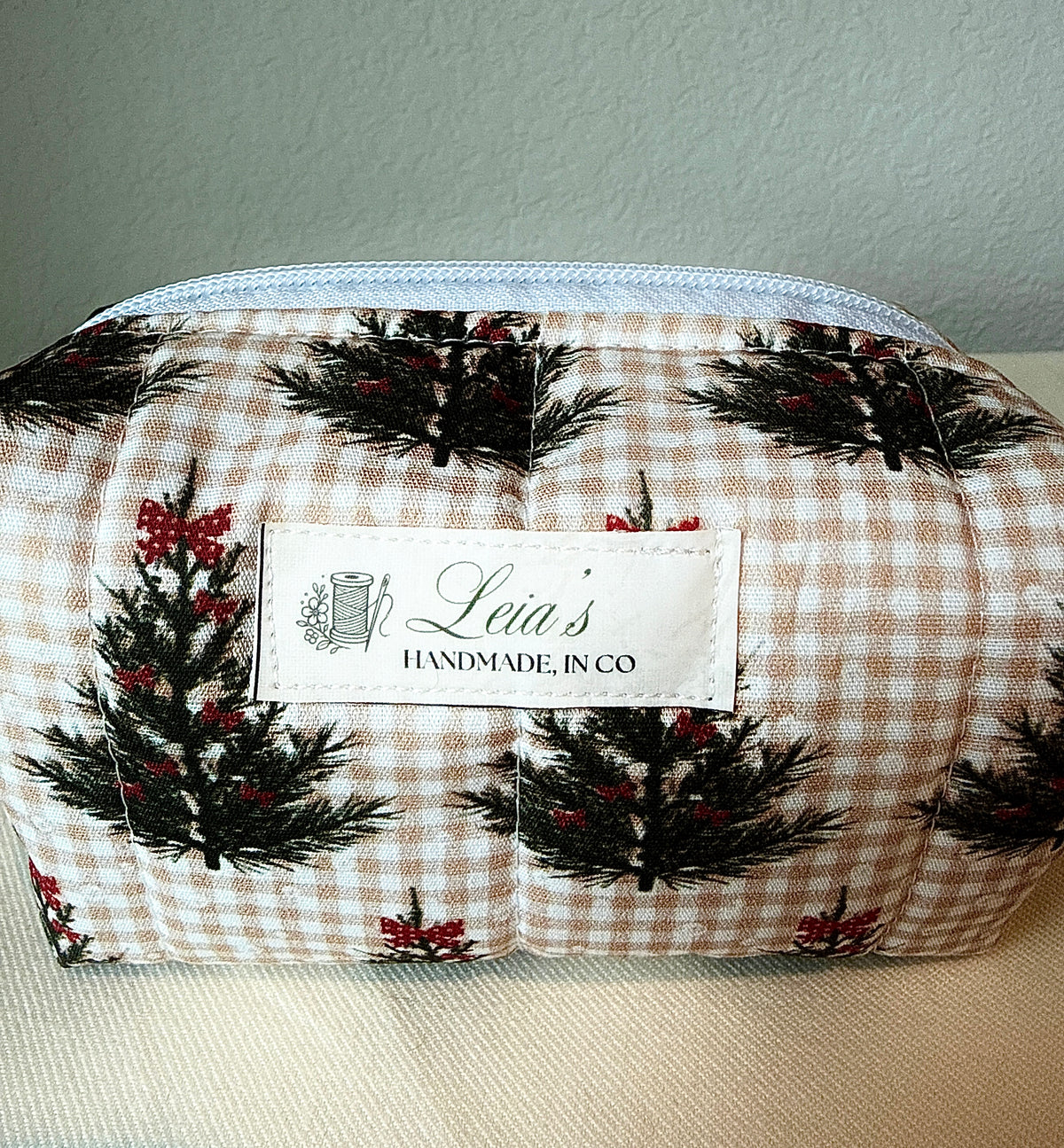 Close-up of the Winter Sprig fabric print and Leia’s handmade label