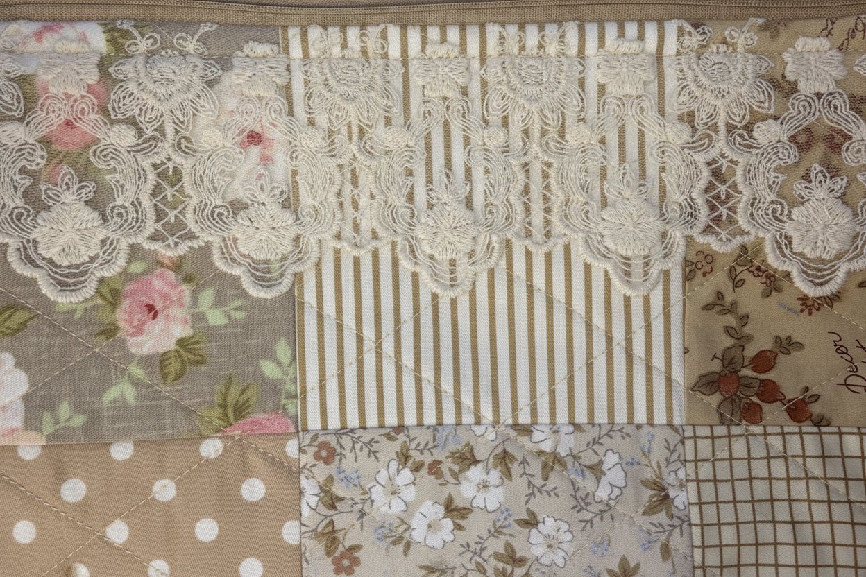 Close-up of outer fabric and lace trim.