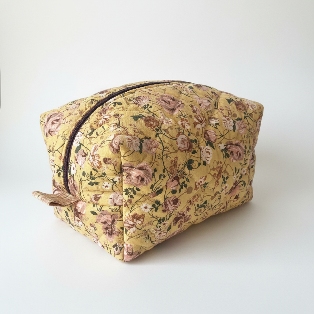 Yellow floral quilted boxy bag - side view showing quilted texture