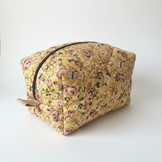 Yellow floral quilted boxy bag - side view showing quilted texture